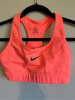 Nike Women's Coral-Pink Dri-FIT Racerback Sports Bra